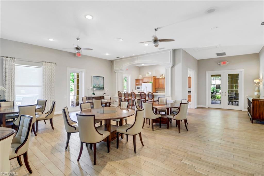 9801 Foxhall Way, Unit 4 Estero, FL 33928 - Photo 23 of 23 Dining room with french doors, recessed lighting, light wood-style flooring, and healthy amount of natural light