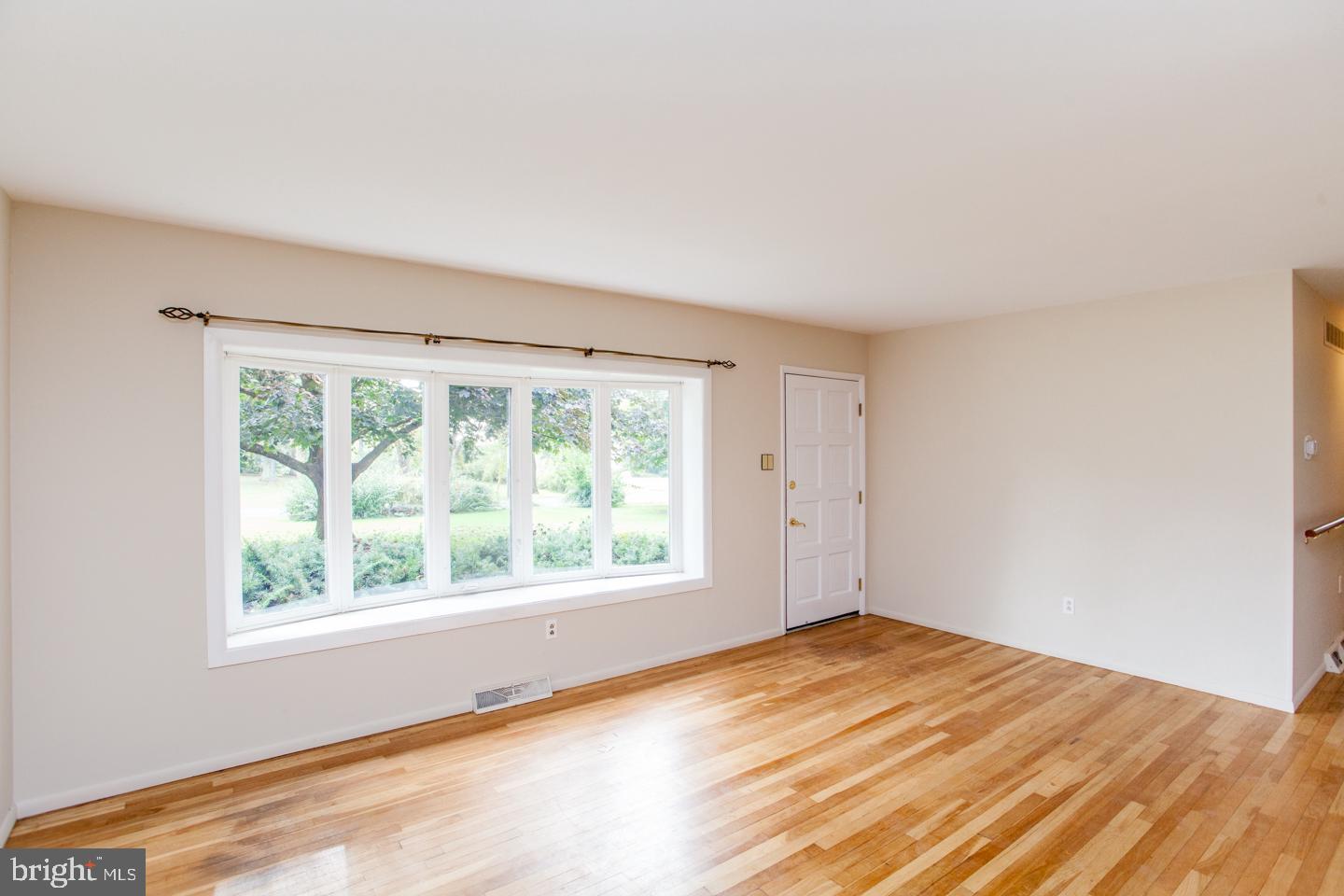 518 Upper Stump Road Chalfont, PA 18914 - Photo 11 of 62 a view of empty room with wooden floor and fan