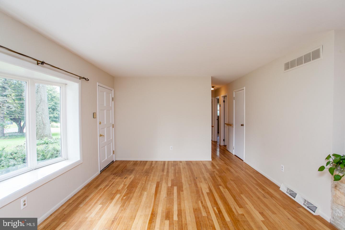 518 Upper Stump Road Chalfont, PA 18914 - Photo 12 of 62 a view of a room with wooden floor and brick walls