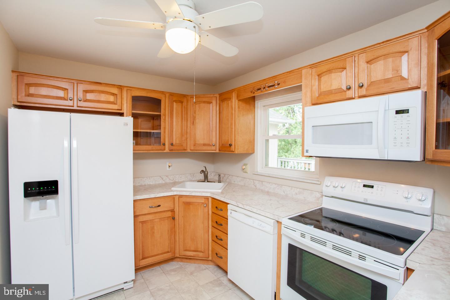 518 Upper Stump Road Chalfont, PA 18914 - Photo 19 of 62 a kitchen with a refrigerator a sink and cabinets