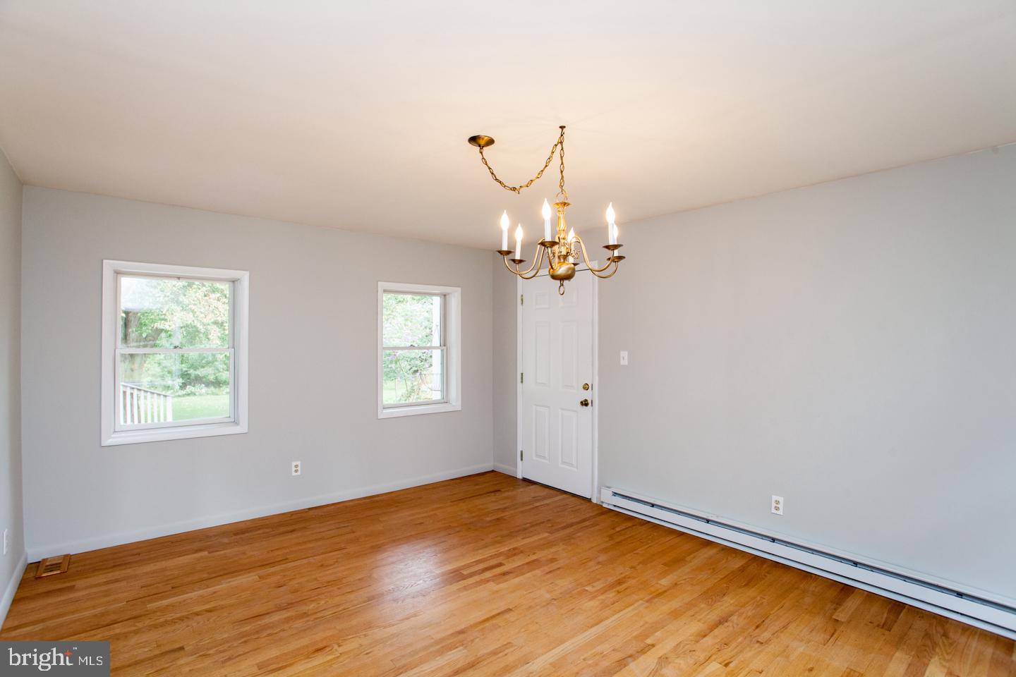 518 Upper Stump Road Chalfont, PA 18914 - Photo 23 of 62 wooden floor in an empty room with a window