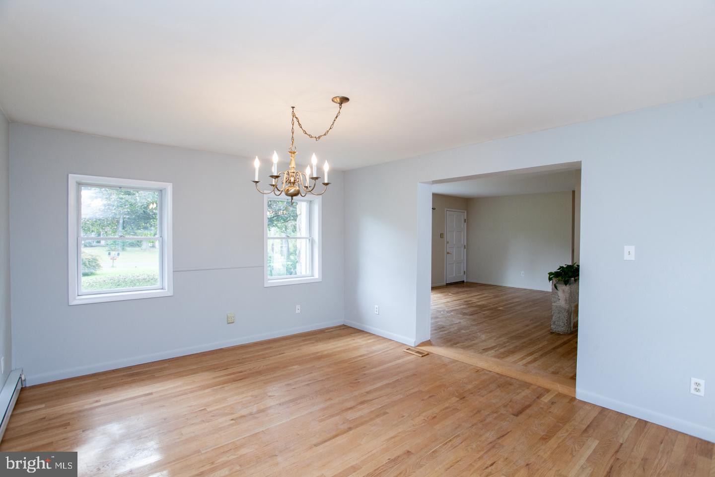 518 Upper Stump Road Chalfont, PA 18914 - Photo 25 of 62 a view of an empty room with wooden floor and a window