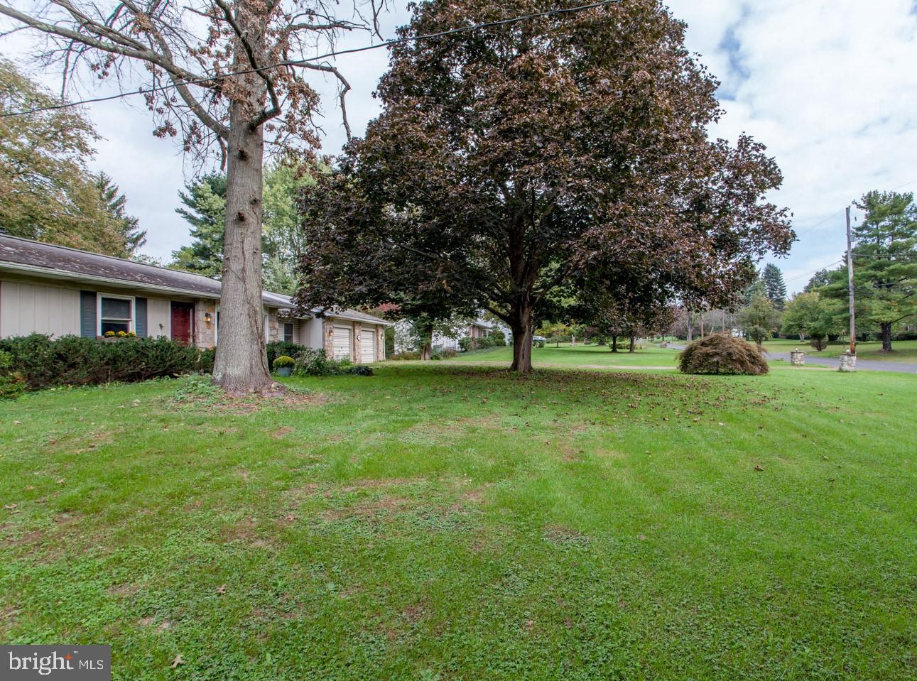 518 Upper Stump Road Chalfont, PA 18914 - Photo 9 of 62 a view of a house with a big yard and large trees