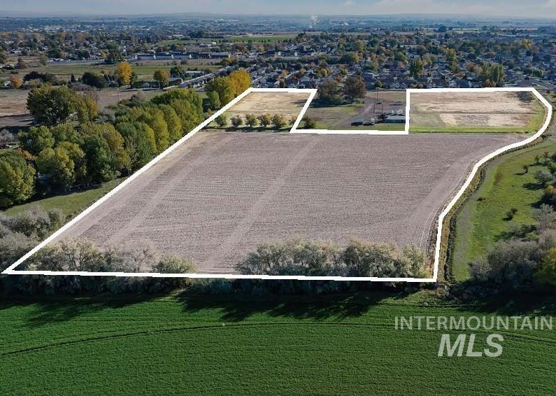 1204 Kenyon Road Twin Falls, ID 83301 - Photo 2 of 3 Overview of rural landscape featuring extensive farmland and property boundaries highlighted