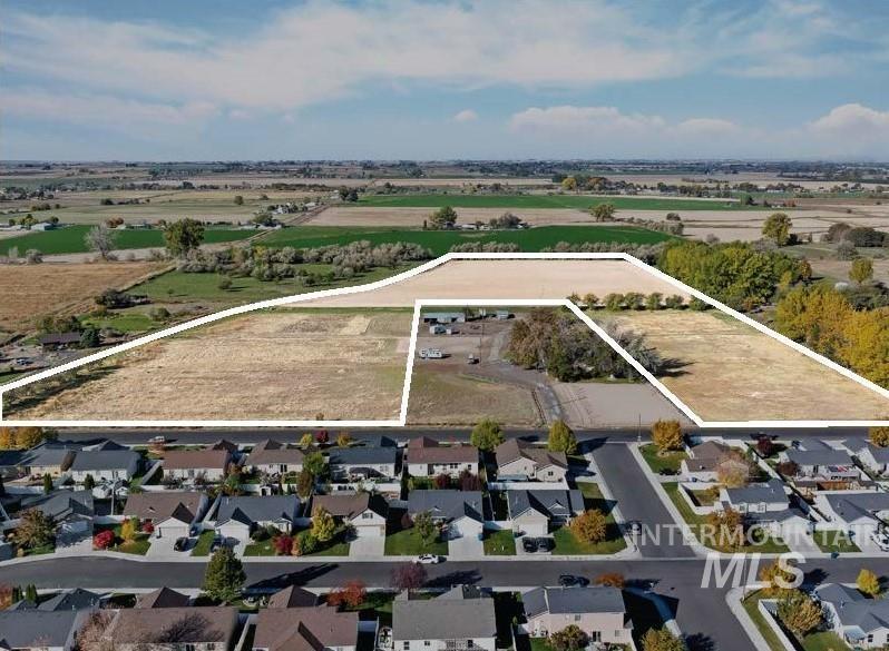 1204 Kenyon Road Twin Falls, ID 83301 - Photo 3 of 3 Aerial view of sparsely populated area featuring nearby suburban area