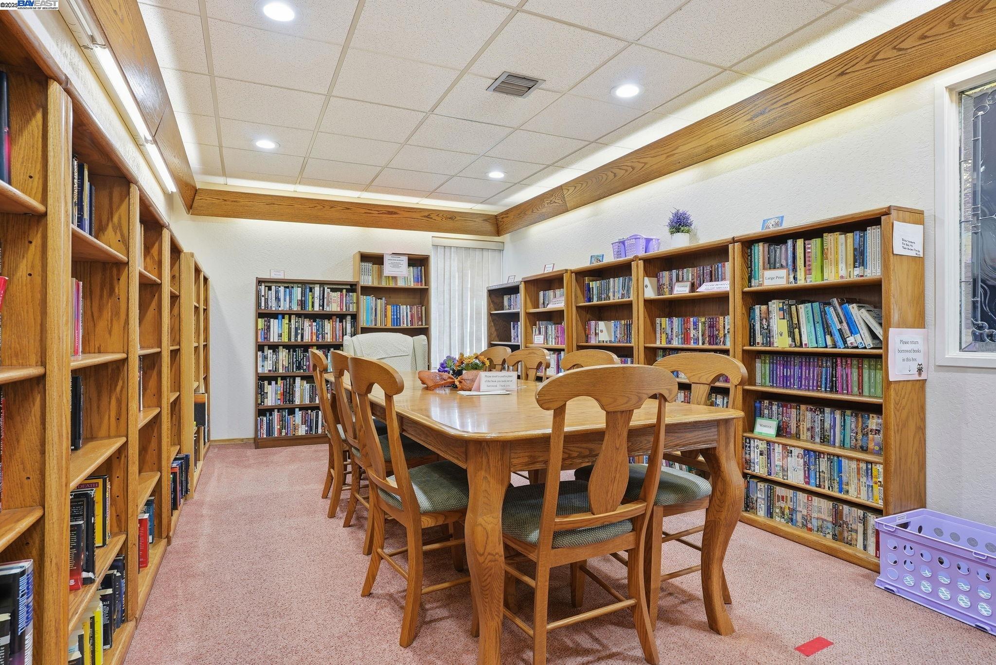 4141 Deep Creek Road, Unit 89 Fremont, CA 94555 - Photo 46 of 54 a dining room with furniture and a book shelf