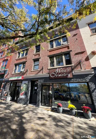 a view of street with shops