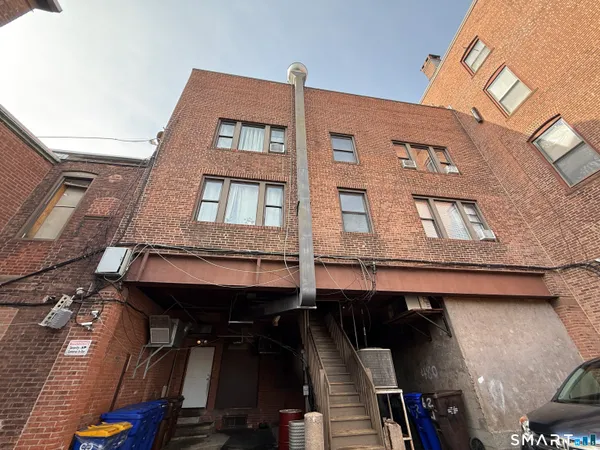 a front view of a building with glass windows