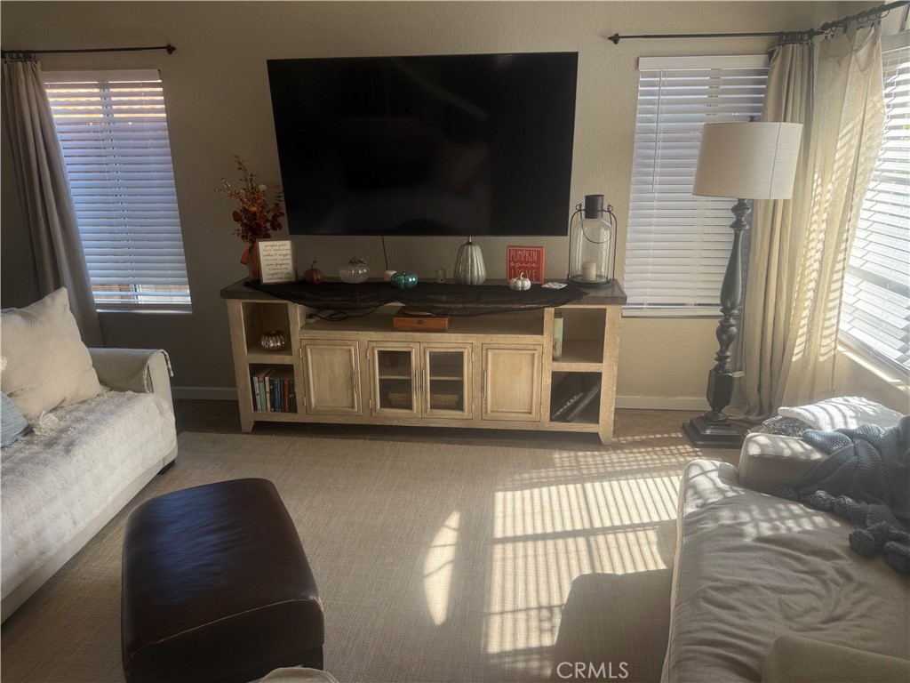 29870 Vail Brook Drive Temecula, CA 92591 - Photo 3 of 14 a living room with furniture and a flat screen tv