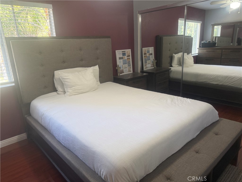 29870 Vail Brook Drive Temecula, CA 92591 - Photo 10 of 14 a bed sitting in a bedroom next to a window