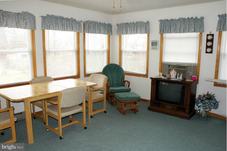 22 Mansion Road Linthicum Heights, MD 21090 - Photo 13 of 20 a living room with furniture and a window