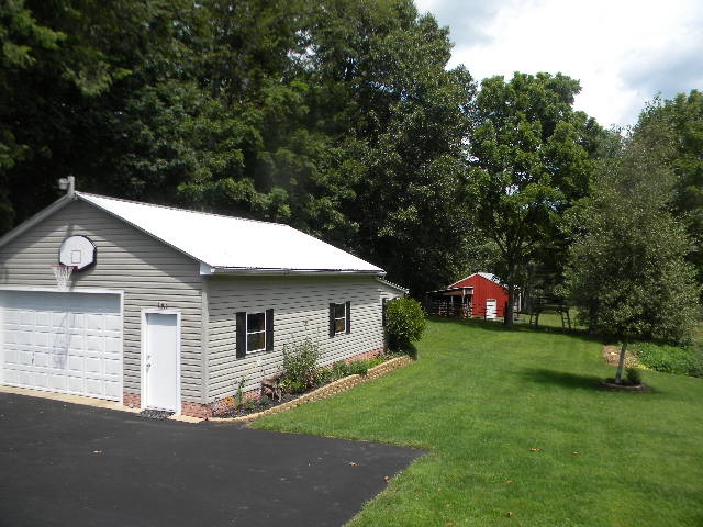 280 George Home Road Waynesboro, VA 22980 - Photo 23 of 29 a backyard of a house with lots of green space and fountain