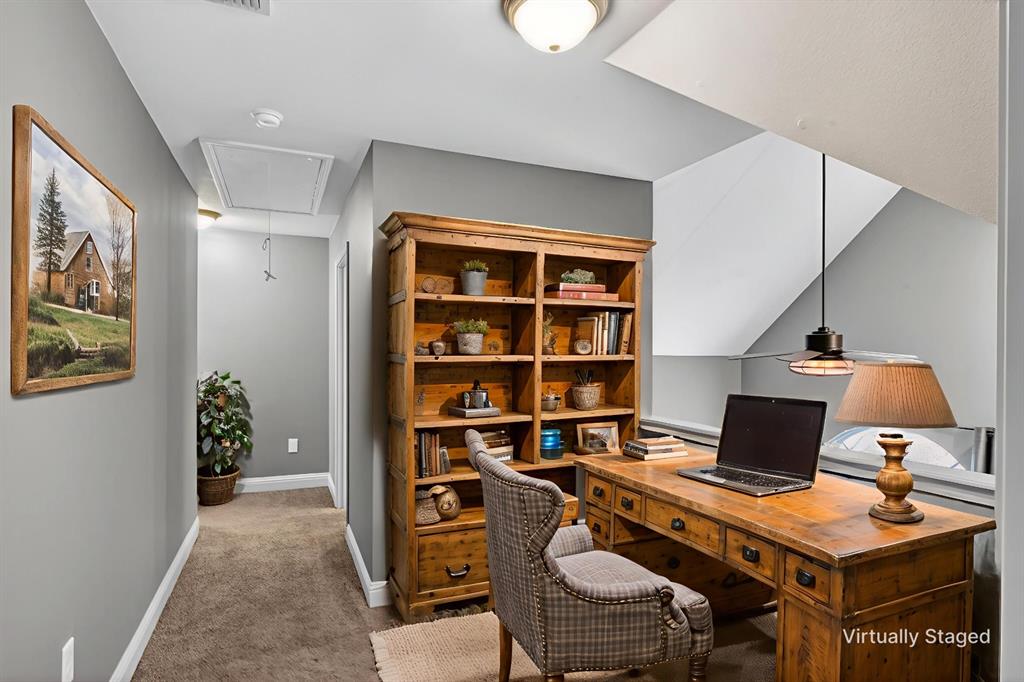 720 Haggerty Road Karnack, TX 75661 - Photo 26 of 39 a workspace with furniture and book shelf