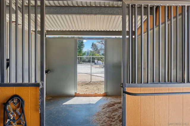 a view of house with outdoor space and sitting area