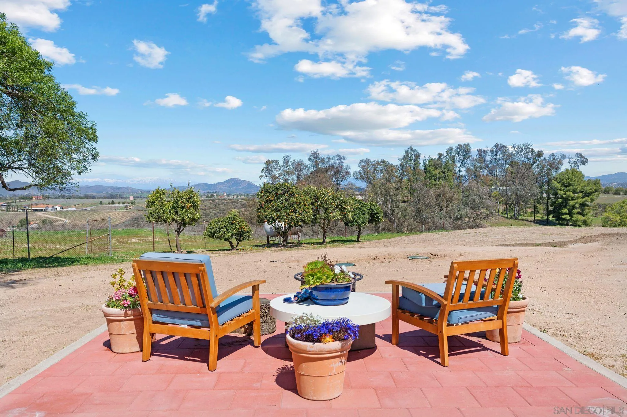 34020 Madera De Playa Drive Temecula, CA 92592 - Photo 22 of 24 a view of a patio with chairs and a table