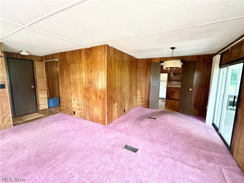 28 Richter Road Colliers, WV 26035 - Photo 4 of 38 Living room featuring carpet flooring