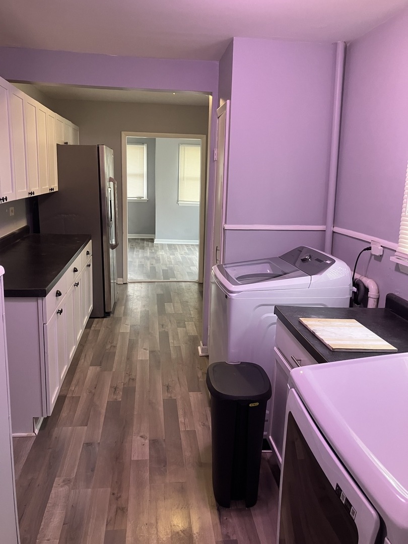1432 Ridgeway Street Round Lake Beach, IL 60073 - Photo 11 of 20 a kitchen with a sink and a refrigerator