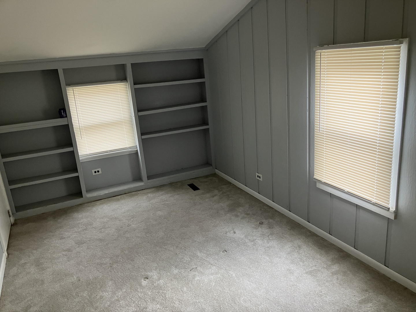1432 Ridgeway Street Round Lake Beach, IL 60073 - Photo 19 of 20 a view of an empty room with a window