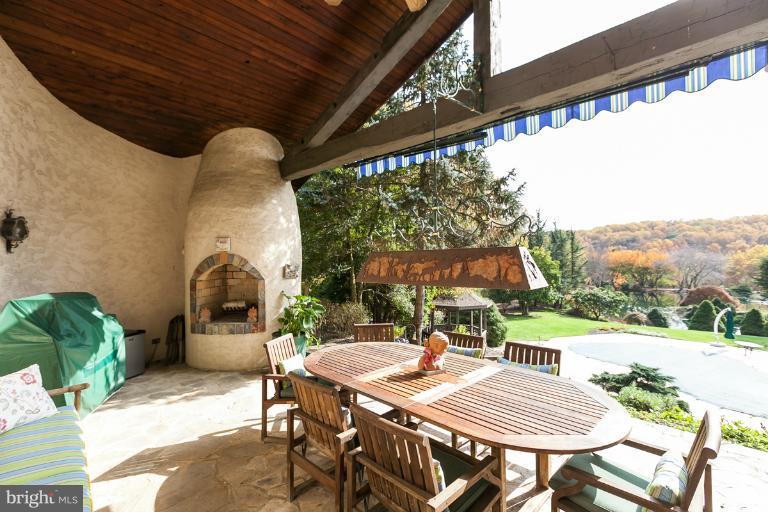 10715 Pot Spring Road Cockeysville, MD 21030 - Photo 22 of 30 Covered Patio with Fireplace