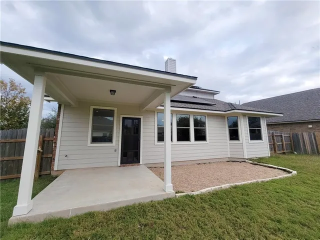 a front view of house with yard