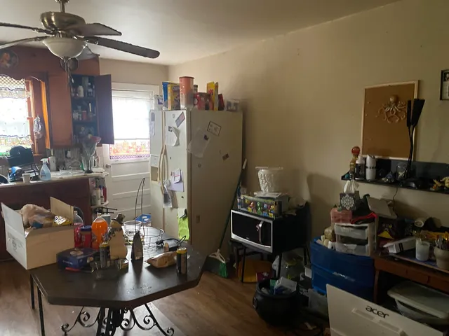 a view of a workspace with furniture