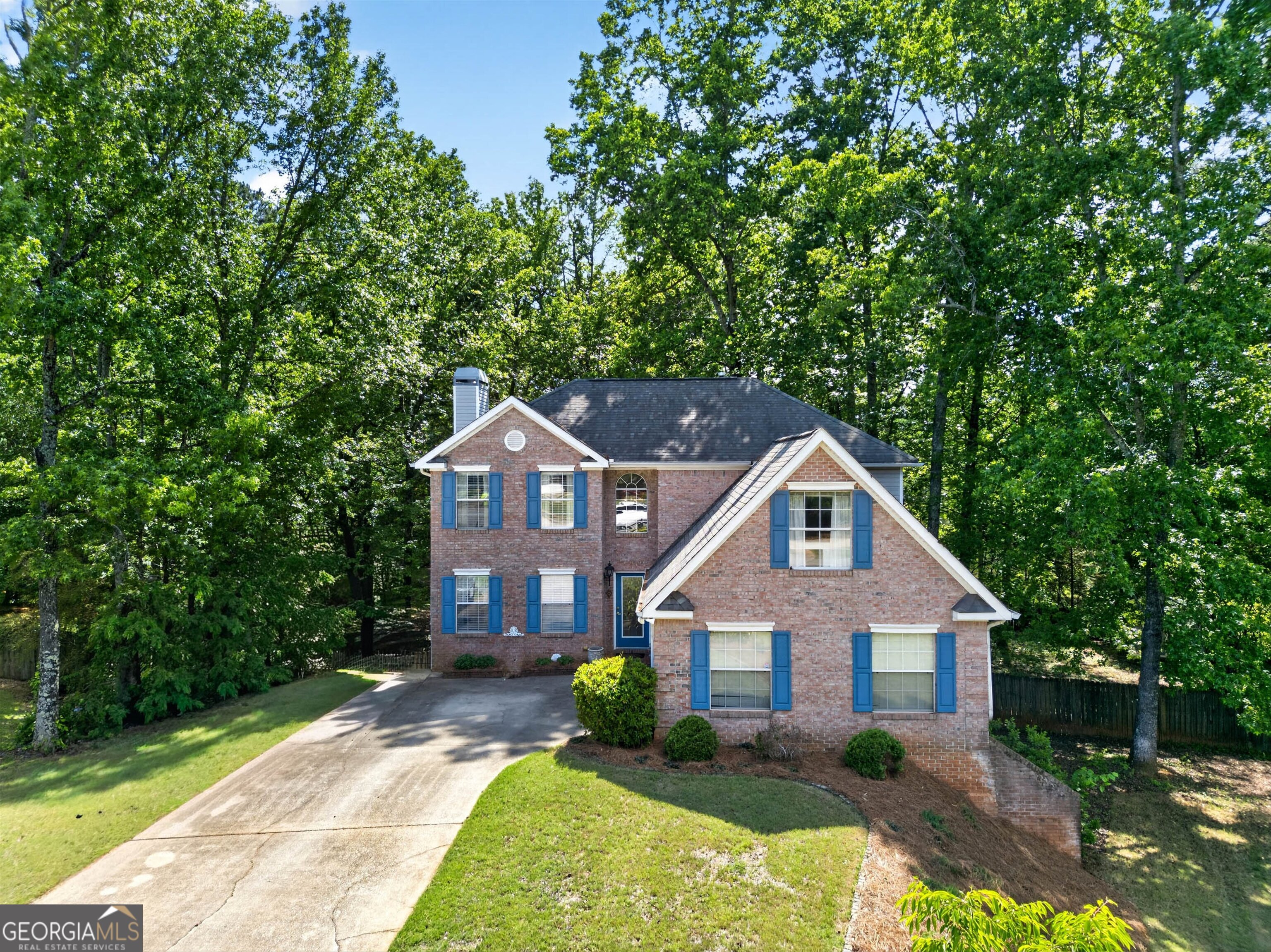 101 Emerald Lane Hampton, GA 30228 - Photo 62 of 72 a front view of a house with garden