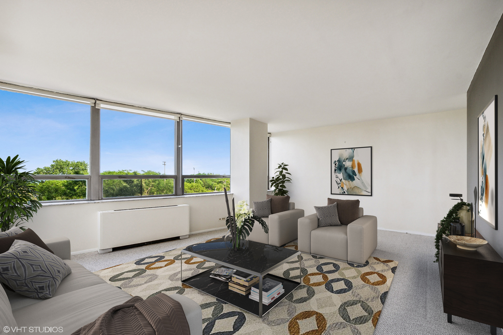 5701 North Sheridan Road, Unit 5K Chicago, IL 60660 - Photo 4 of 24 a bed room with a bed a couch and a potted plant