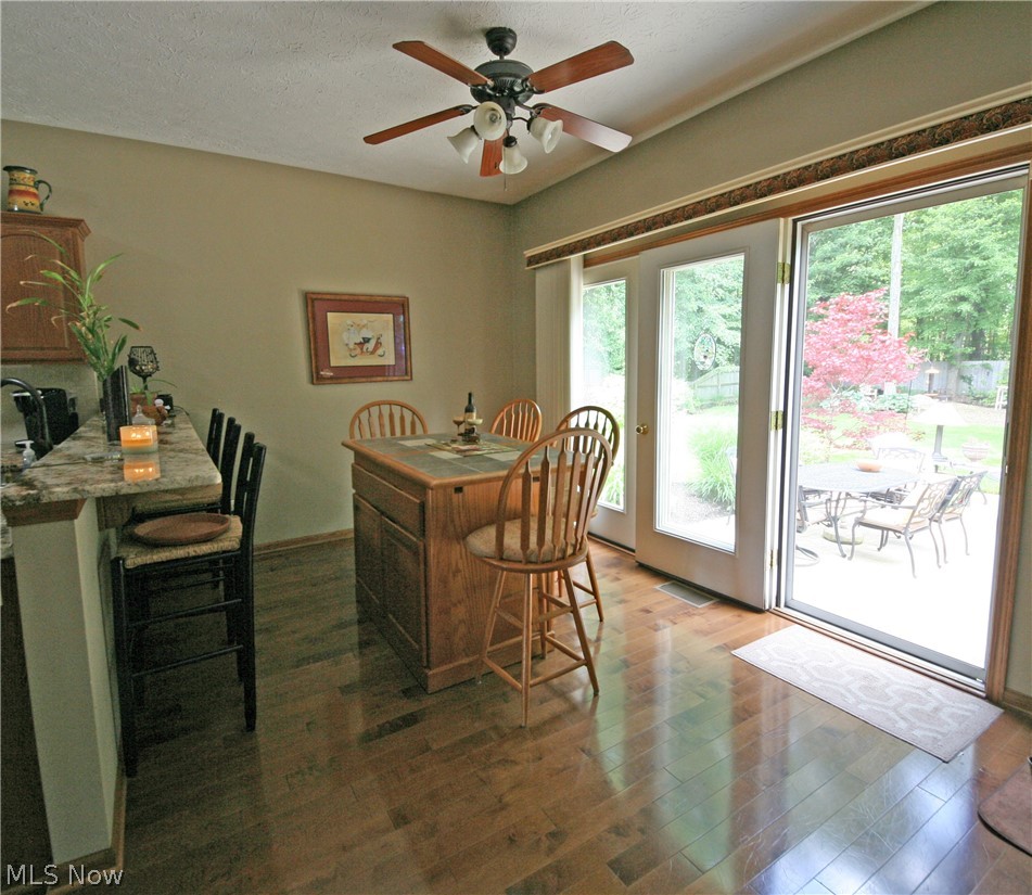 107 Timber Ridge Drive Elyria, OH 44035 - Photo 10 of 34 Lots of natural light flows in through the patio door, bringing the beauty of the back yard in.