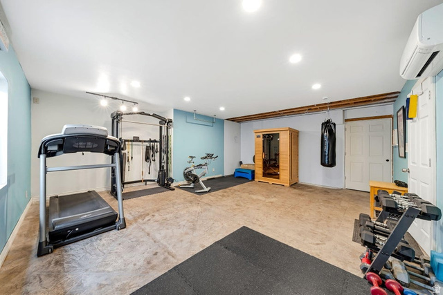 7776 Wagon Road East St. George, UT 84770 - Photo 45 of 76 Workout area featuring a mini split for heating / cooling, a sauna, and recessed lighting