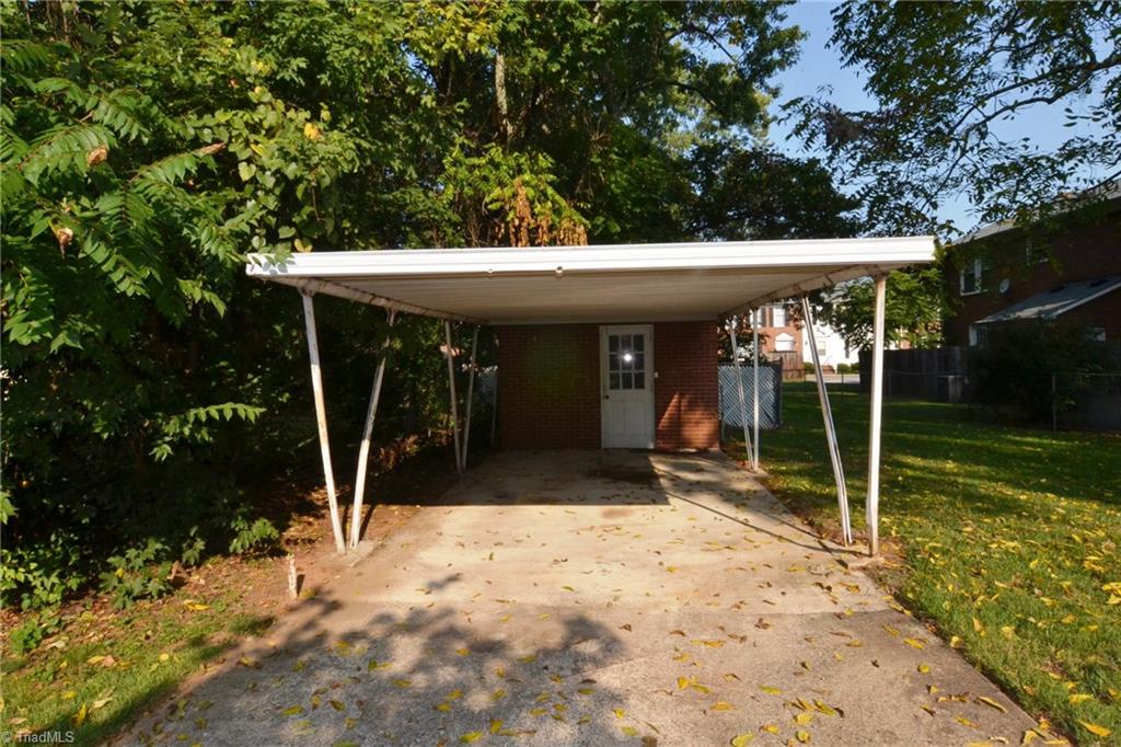305 College Road Greensboro, NC 27410 - Photo 11 of 13 Carport & Storage Room