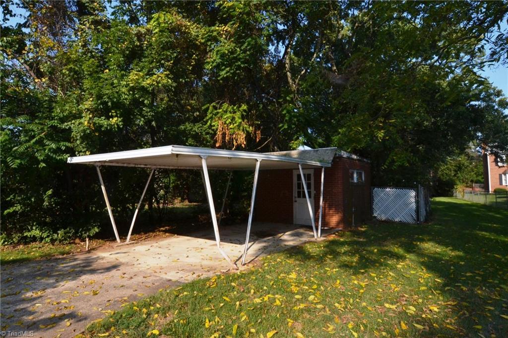 305 College Road Greensboro, NC 27410 - Photo 12 of 13 Carport & Storage Room