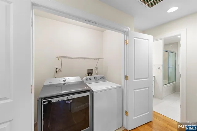 a utility room with dryer and washer