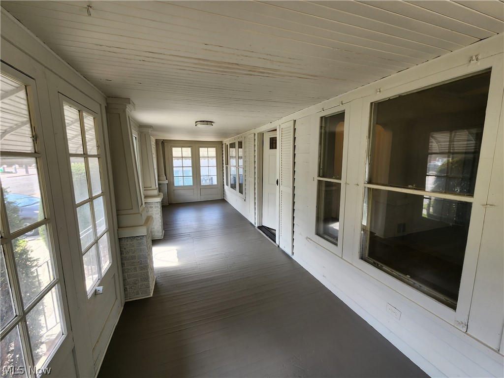 7202 Snow Road Parma, OH 44129 - Photo 9 of 14 View of unfurnished sunroom