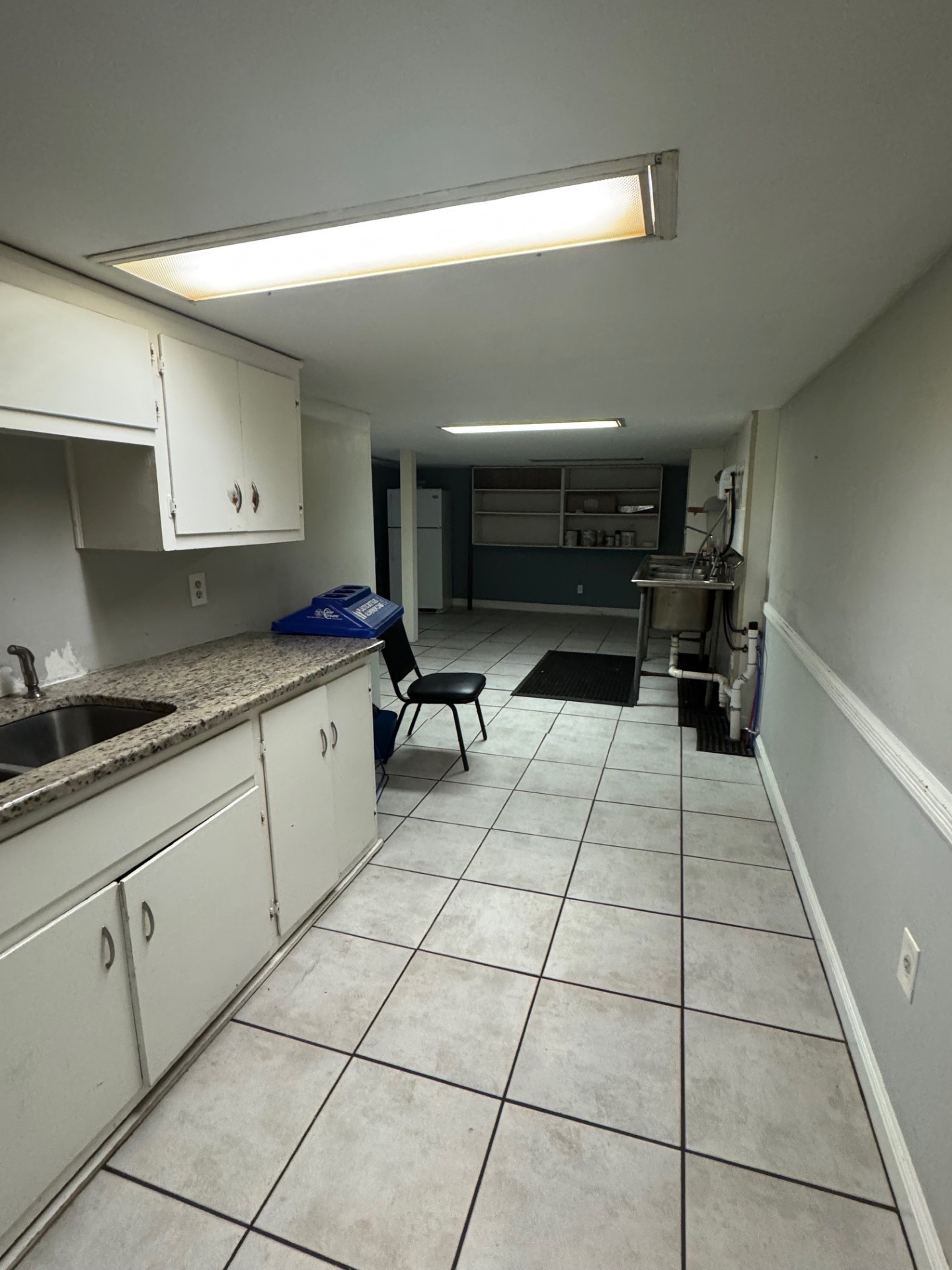 137 Franklin Street Clarksville, TN 37040 - Photo 8 of 16 a kitchen with stainless steel appliances cabinets and stove top oven