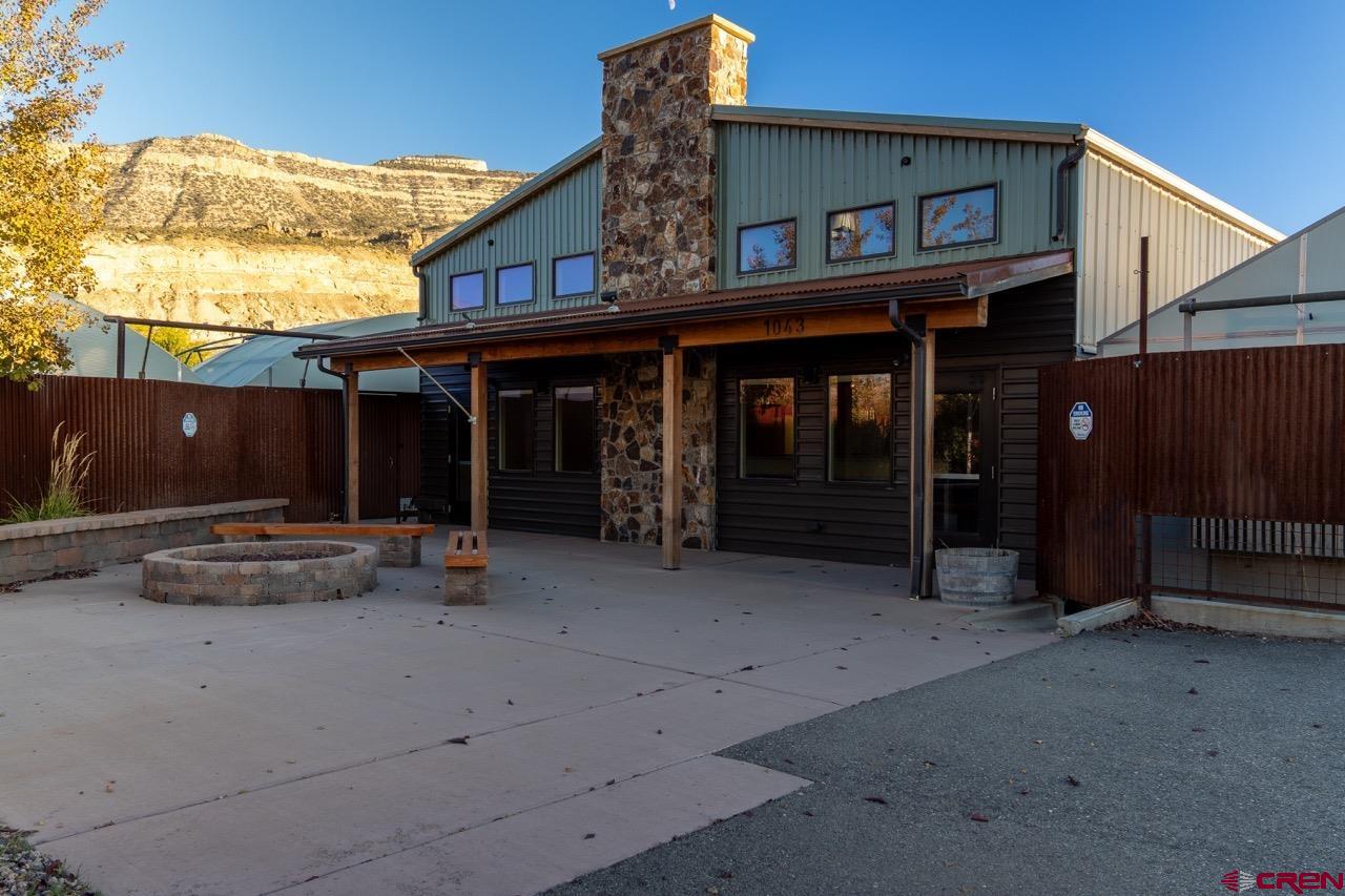 1043 North River Road Palisade, CO 81526 - Photo 2 of 8 a view of a house with patio
