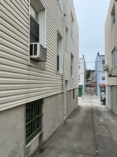 1324 68th Street Brooklyn, NY 11219 - Photo 2 of 3 a view of a kitchen with many windows