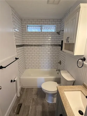 a bathroom with a sink and a shower