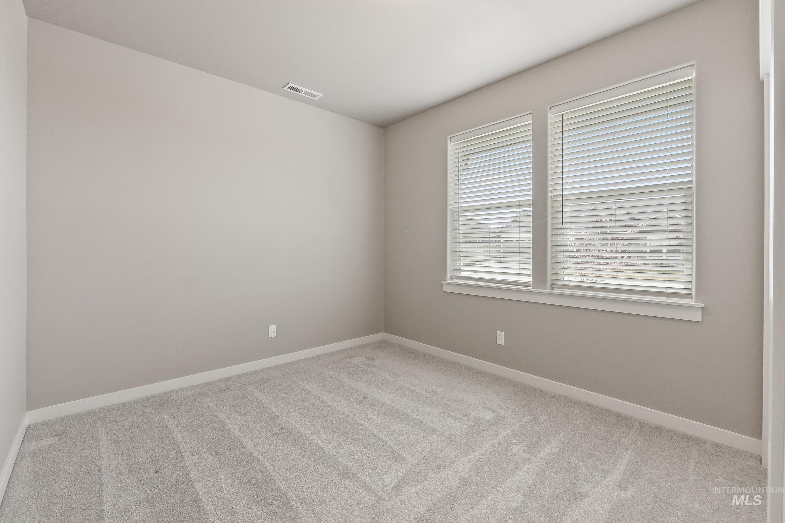 10308 West Trident Ridge Drive Star, ID 83669 - Photo 29 of 42 Unfurnished room featuring light colored carpet