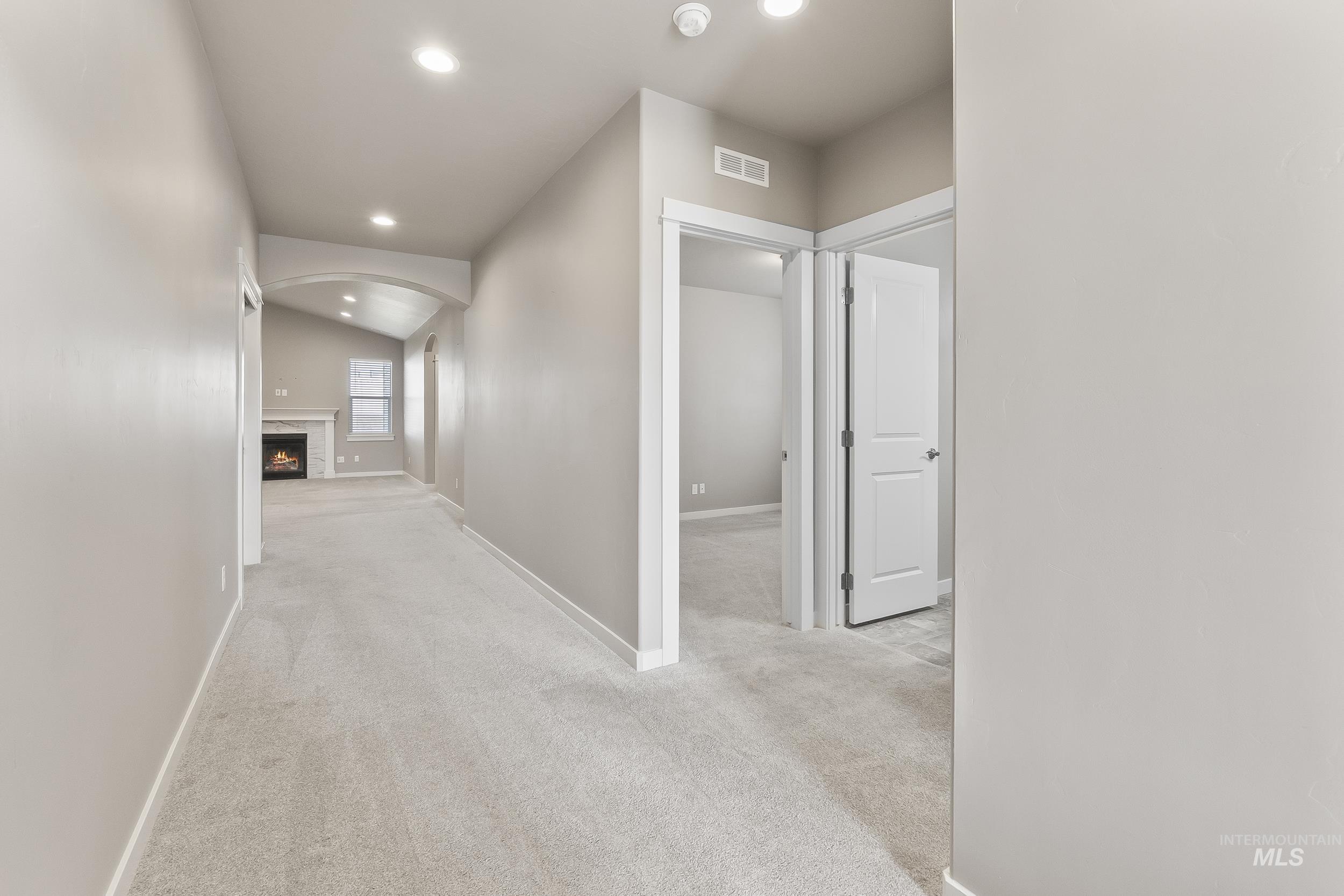 10308 West Trident Ridge Drive Star, ID 83669 - Photo 6 of 42 Hall with recessed lighting and light carpet