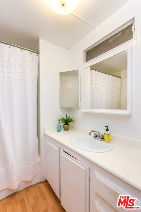 36 Copra Lane Pacific Palisades, CA 90272 - Photo 13 of 31 a bathroom with a sink and a mirror
