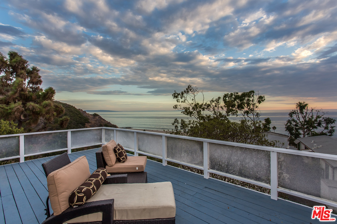 36 Copra Lane Pacific Palisades, CA 90272 - Photo 20 of 31 a view of a terrace with couches