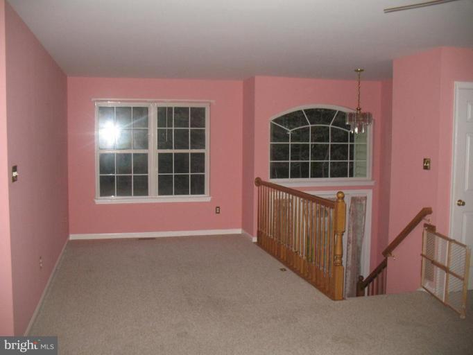 225 Barstow Road Prince Frederick, MD 20678 - Photo 7 of 10 a view of front door of house