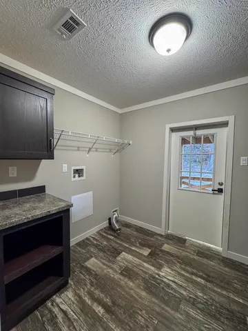 a view of storage and utility room