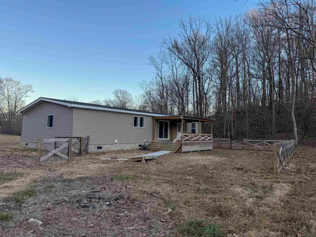 a backyard of a house with seating space