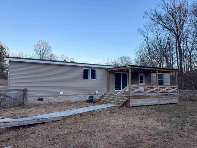 a view of a house with a patio