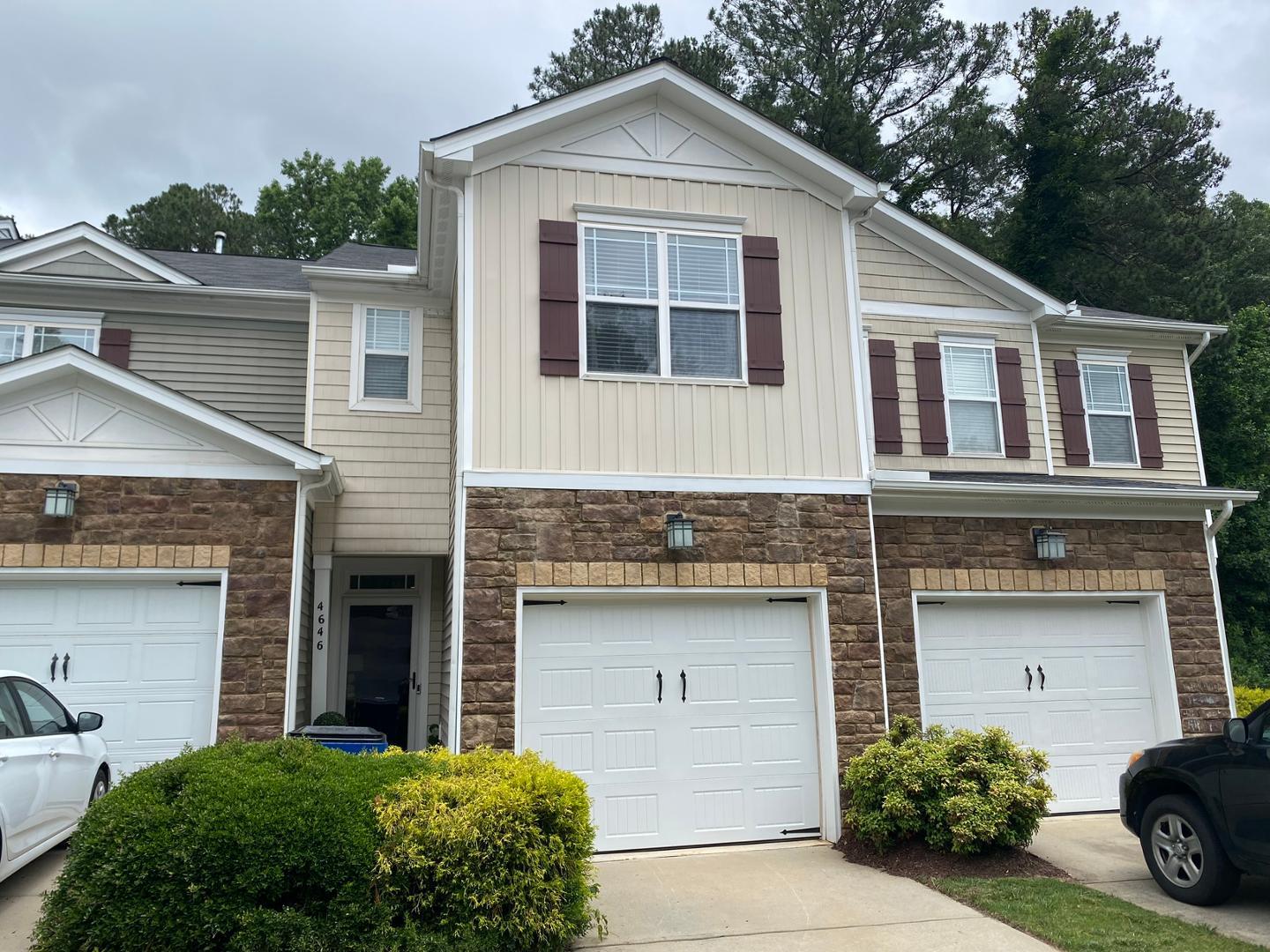 a house view with a garden space