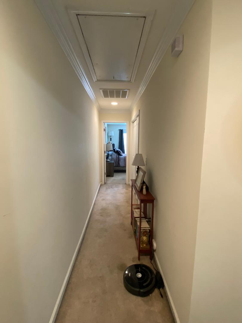 4646 Altha Street Raleigh, NC 27606 - Photo 15 of 23 a view of a livingroom with furniture and a window