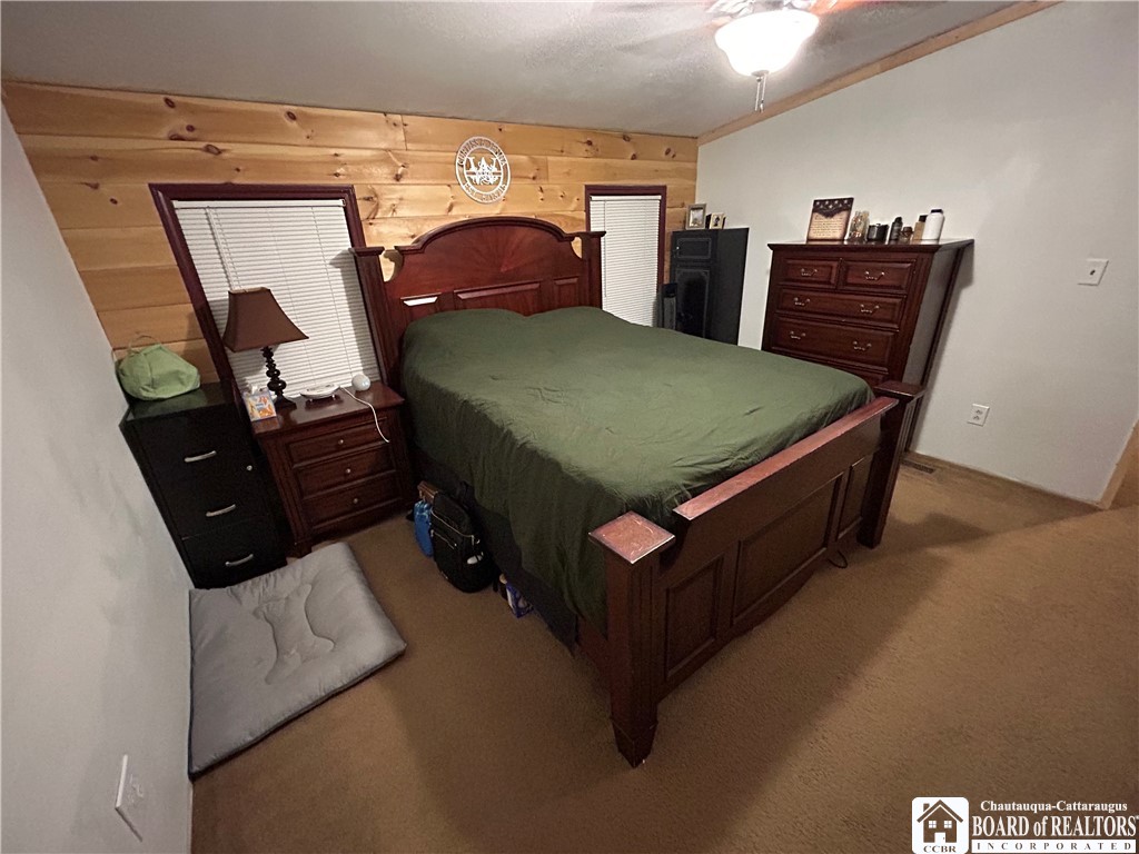 308 Ericsson Road Kennedy, NY 14747 - Photo 25 of 32 Primary bedroom from bathroom suite