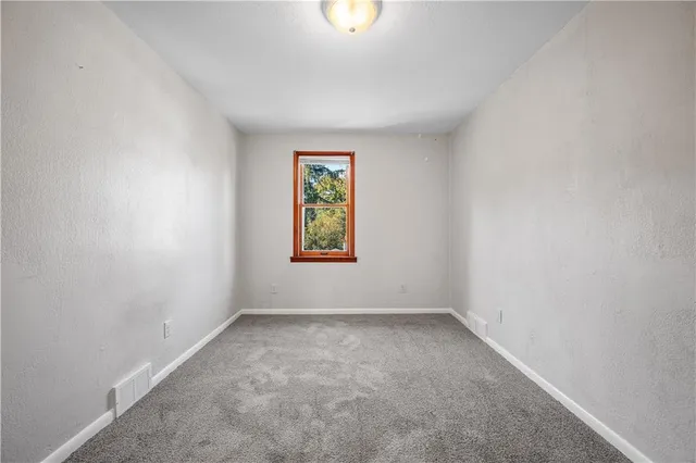 an empty room with a natural light