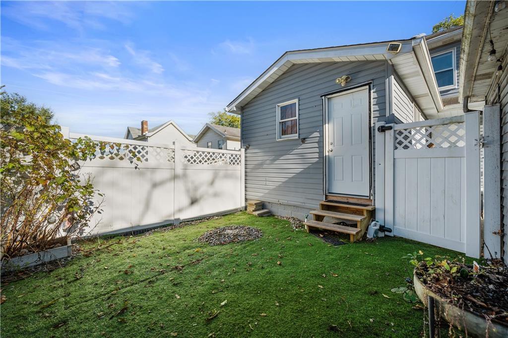 920 Watson Street Coraopolis, PA 15108 - Photo 3 of 36 a front view of a house with a garden